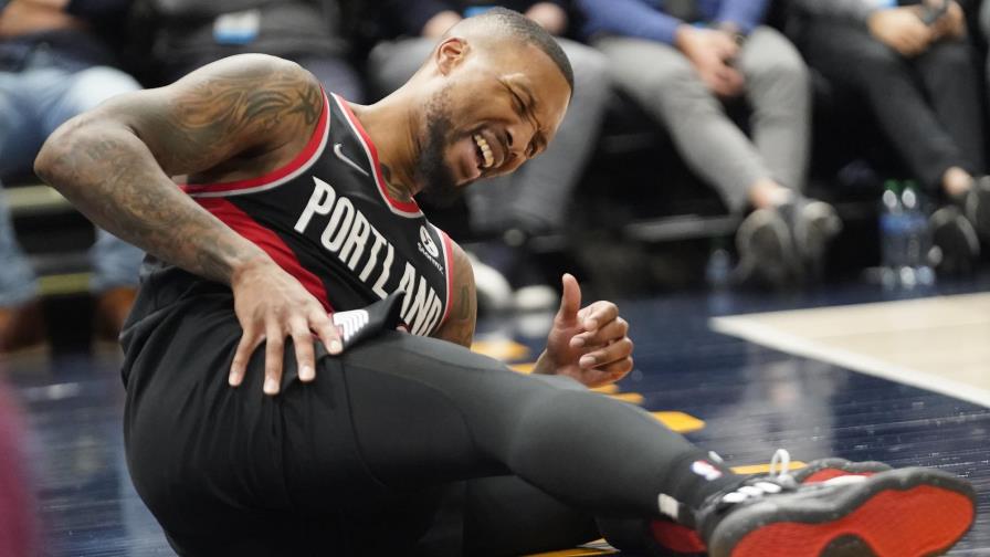 Lillard se perderá al menos 10 días con lesión abdominal Lillard se perderá al menos 10 días con lesión abdominal