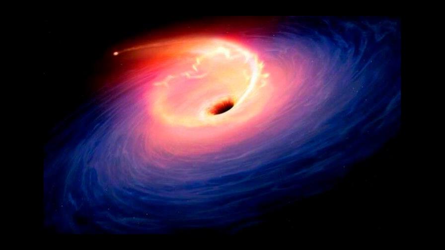Detectan una rara explosión de luz de estrella desgarrada por agujero negro Detectan una rara explosión de luz de estrella desgarrada por agujero negro