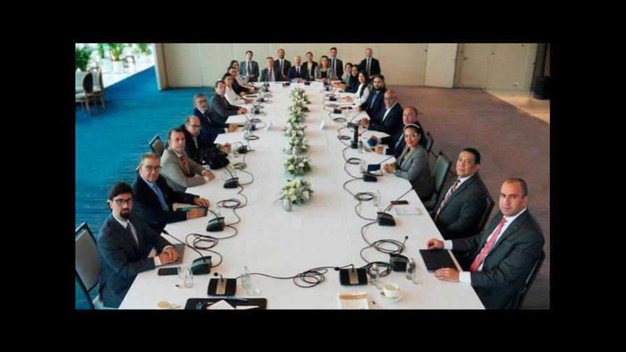 “Acuerdos parciales” en segunda jornada de diálogo entre gobierno y oposición venezolanos “Acuerdos parciales” en segunda jornada de diálogo entre gobierno y oposición venezolanos