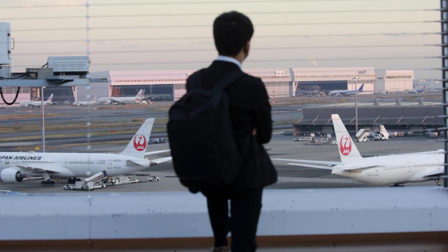 Japón para reservas de vuelos, variante ómicron se expande