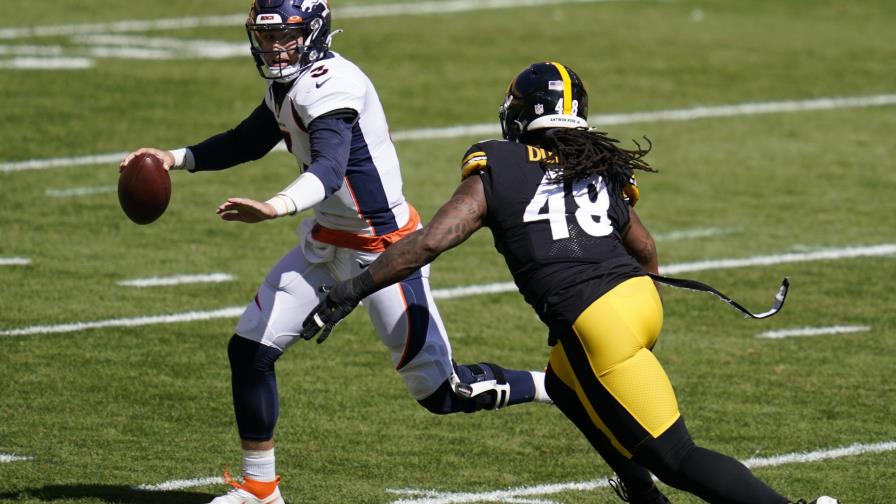 Lock sale lesionado y Steelers frenan remontada de Broncos
