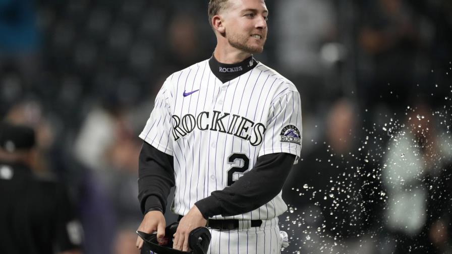 Rockies vencen a Rangers con wild pitch en la 11ma