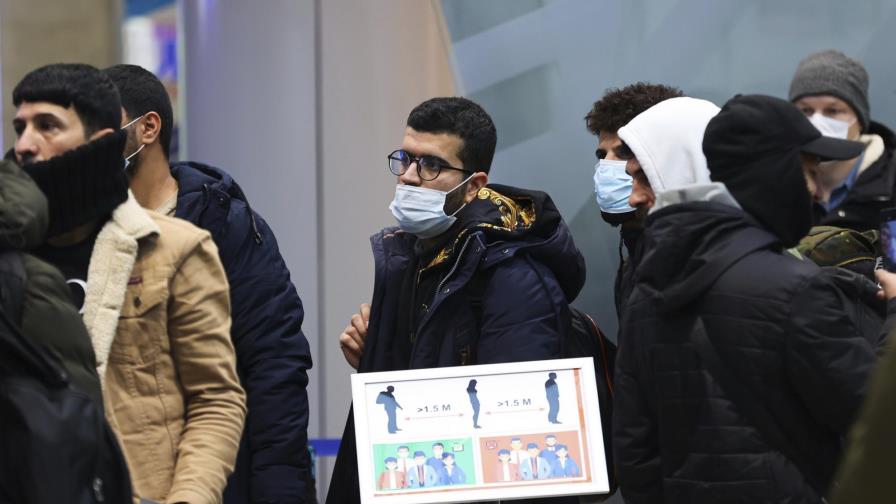 Migrantes iraquíes varados en Bielorrusia regresan a casa