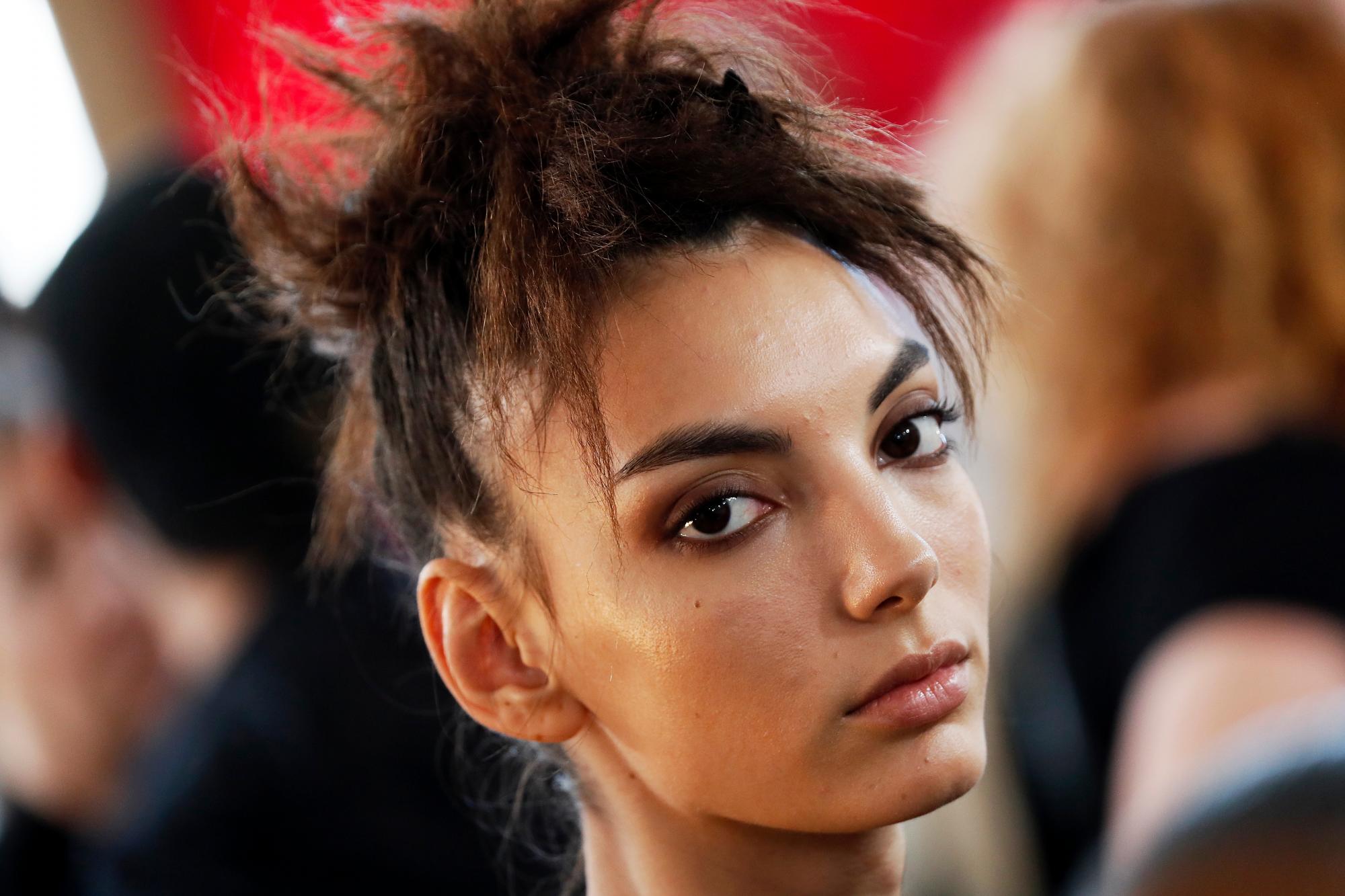 Behind the scenes del desfile de Tom Ford. 