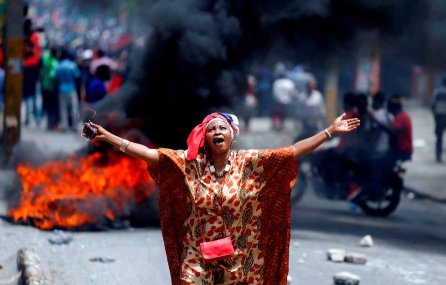 Dos muertos y locales quemados en continuación de protestas en Haití