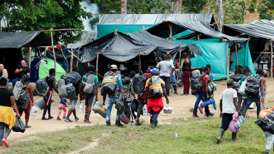 ¿Irse o quedarse? Sube la tensión entre migrantes haitianos en la frontera colombo-panameña