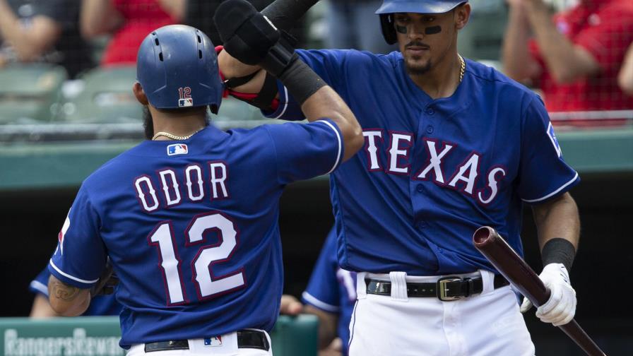 Nomar Mazarra remolcó tres vueltas y los Rangers ganaron en un juego maratónico Nomar Mazarra remolcó tres vueltas y los Rangers ganaron en un juego maratónico