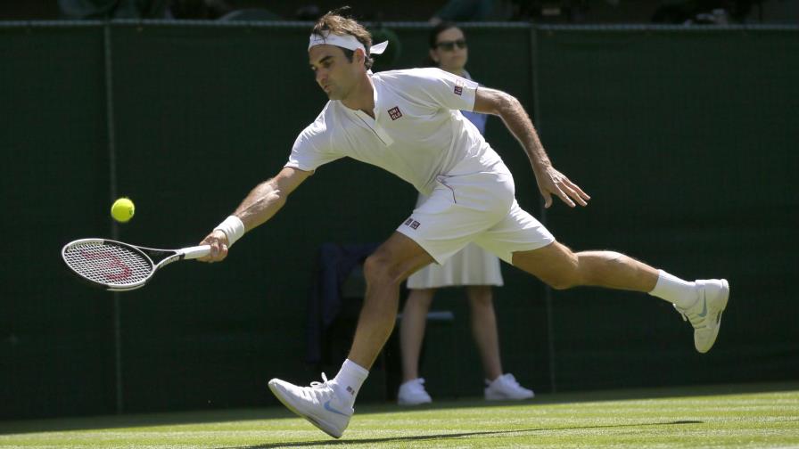 Federer inicia con éxito y sin Nike su defensa de corona de Wimbledon