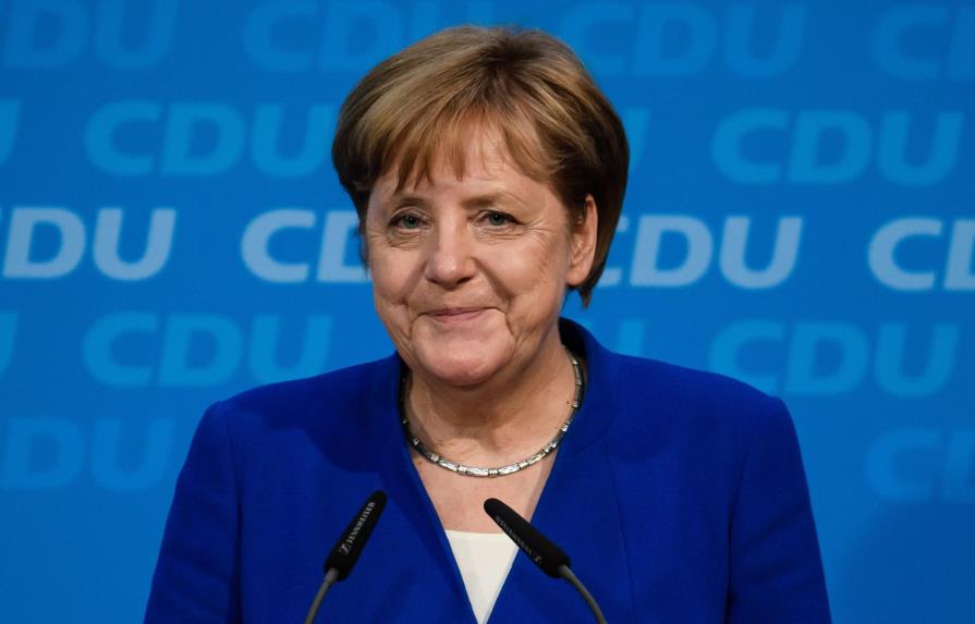 Merkel salva su gobierno con un acuerdo sobre los migrantes