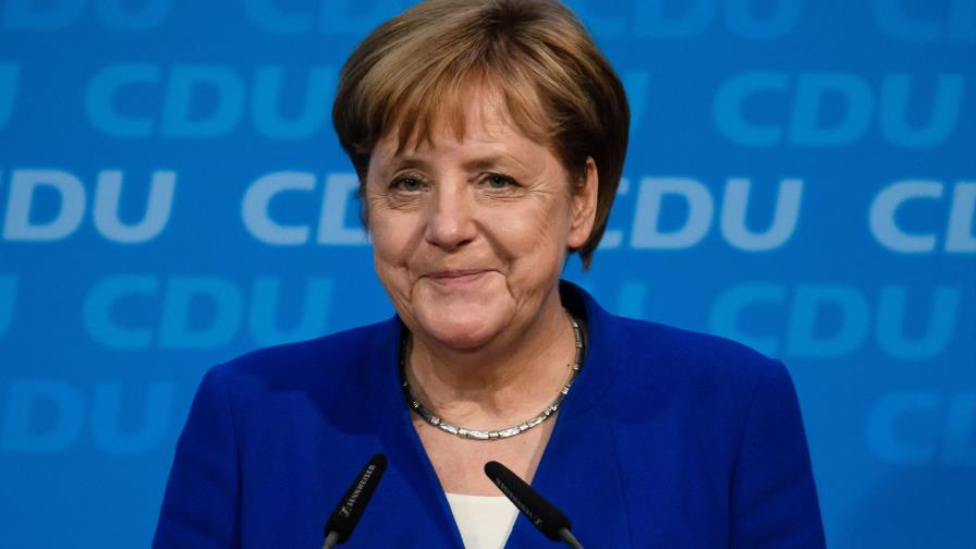 Merkel salva su gobierno con un acuerdo sobre los migrantes
