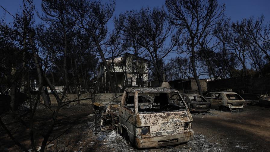 Ascienden a 91 los fallecidos por incendio en Grecia Ascienden a 91 los fallecidos por incendio en Grecia