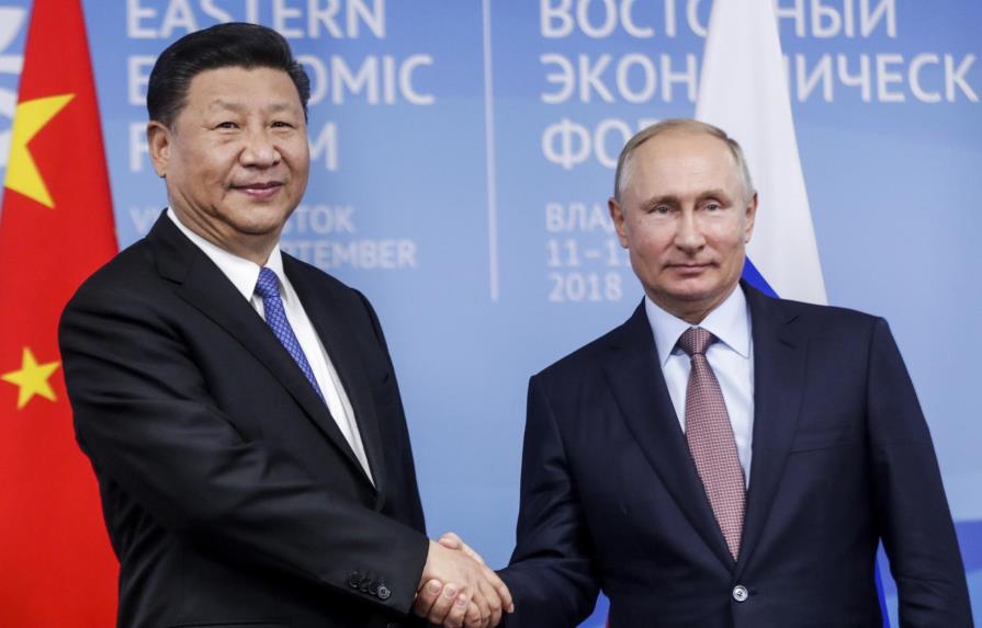 Xi Jinping y Vladimir Putin prometen luchar contra el proteccionismo
