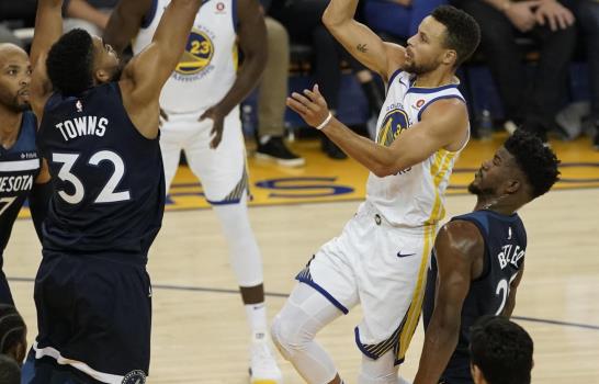 50 puntos entre Curry y Thompson opacan doble-doble de Karl-Anthony Towns 