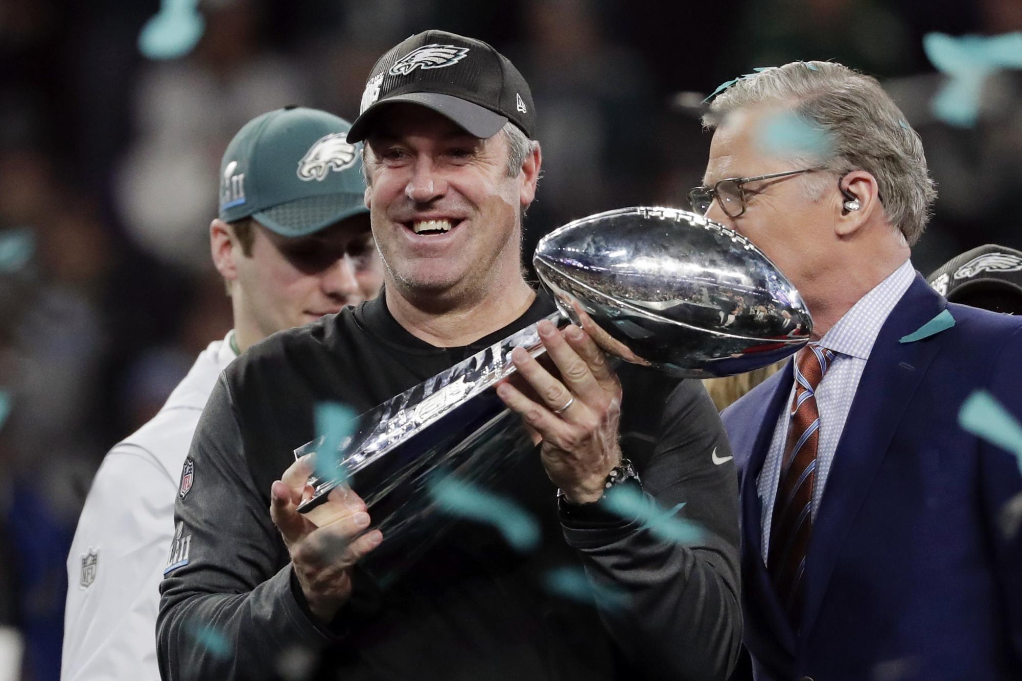 Philadelphia Eagles head coach Doug Pederson holds up the Vincent Lombardi trophy after winning the NFL Super Bowl 52 football game against the New England Patriots, Sunday, Feb. 4, 2018, in Minneapolis. The Eagles won 41-33. 