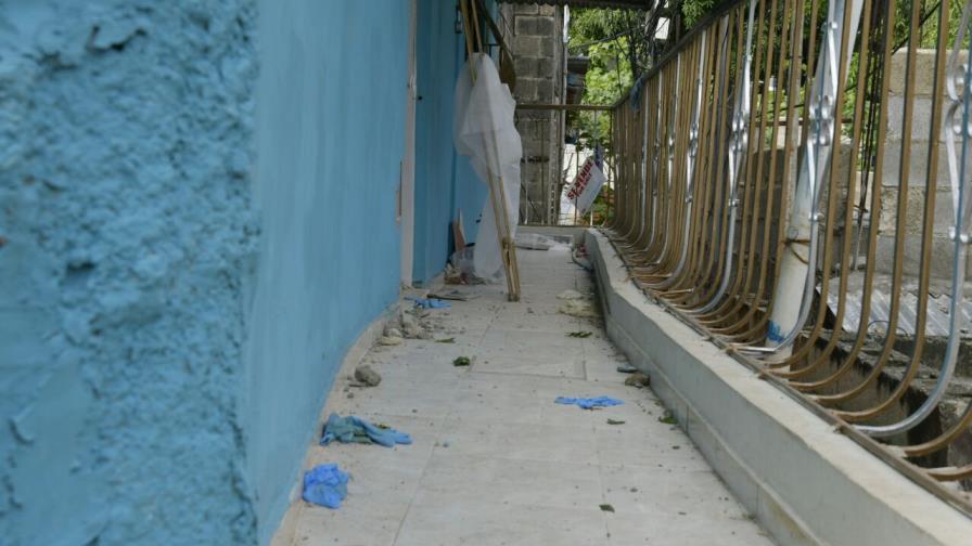 Escena del crimen sigue intacta en casa donde asesinaron mujer y sus tres hijos Escena del crimen sigue intacta en casa donde asesinaron mujer y sus tres hijos