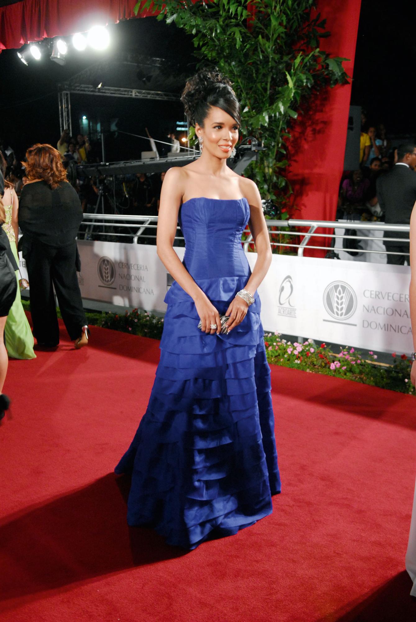 La diseñadora dominicana Belkola (Belkis Vásquez), ahora reside fuera del país. En el 2009, fue la encargada junto a Carlos De Moya y Robert Flores, de vestir a los artistas en escena.