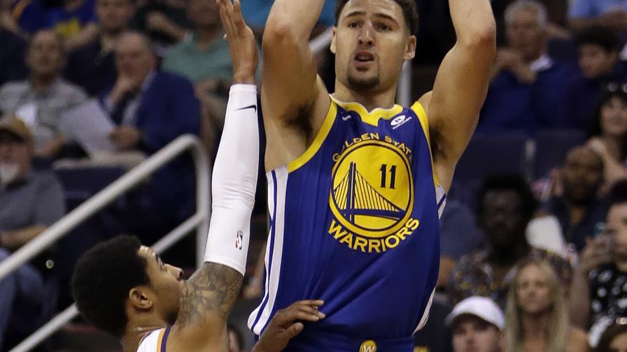 Thompson anota 34 en la victoria corrida número 15 de los Warriors sobre los Suns Thompson anota 34 en la victoria corrida número 15 de los Warriors sobre los Suns