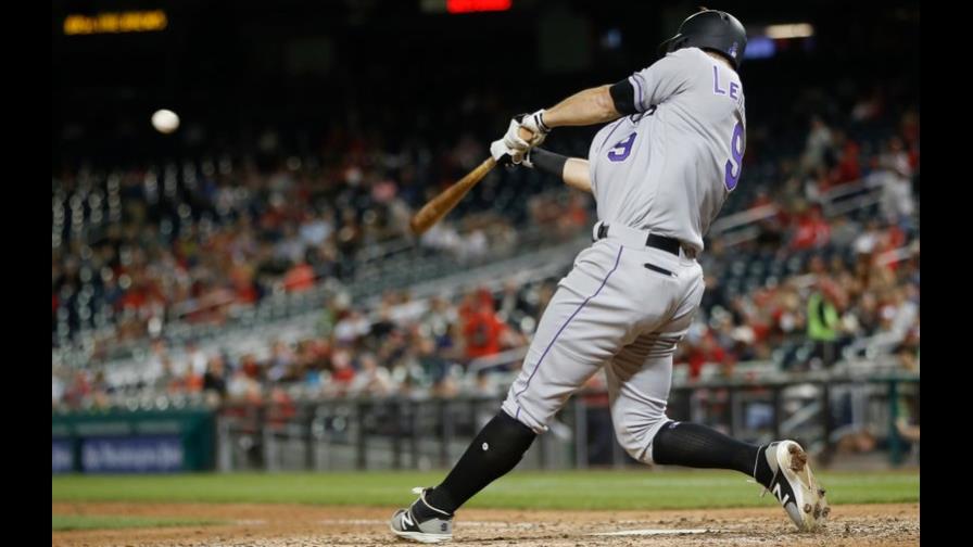 Con dos jonrones de LeMahieu, Rockies vencen a Nacionales