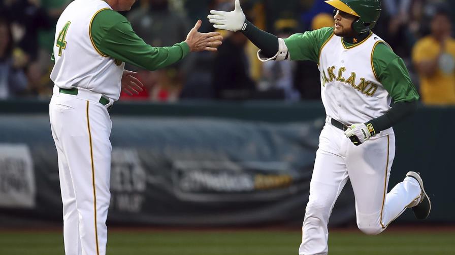 Lowrie jonronea y Atléticos ganan a Medias Blancas 10-2 Lowrie jonronea y Atléticos ganan a Medias Blancas 10-2