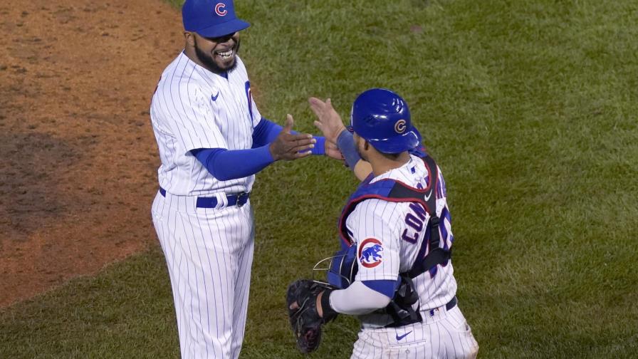 Hoerner, Happ y bullpen guían a Cachorros ante Rojos