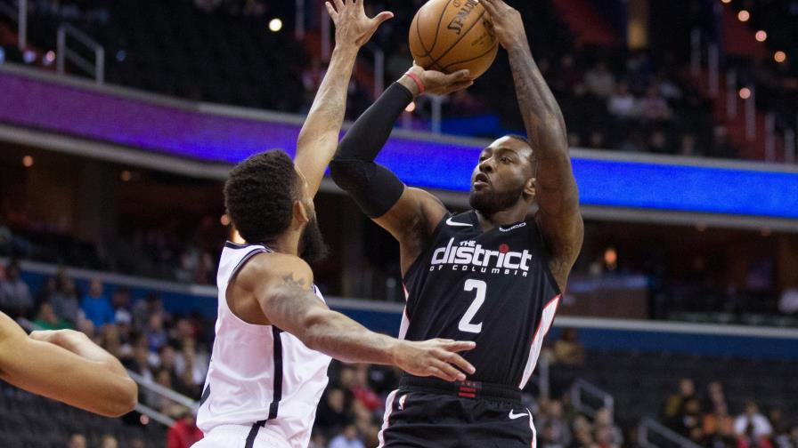 Wizards multan a Wall; según se informó él y Beal están en el mercado Wizards multan a Wall; según se informó él y Beal están en el mercado