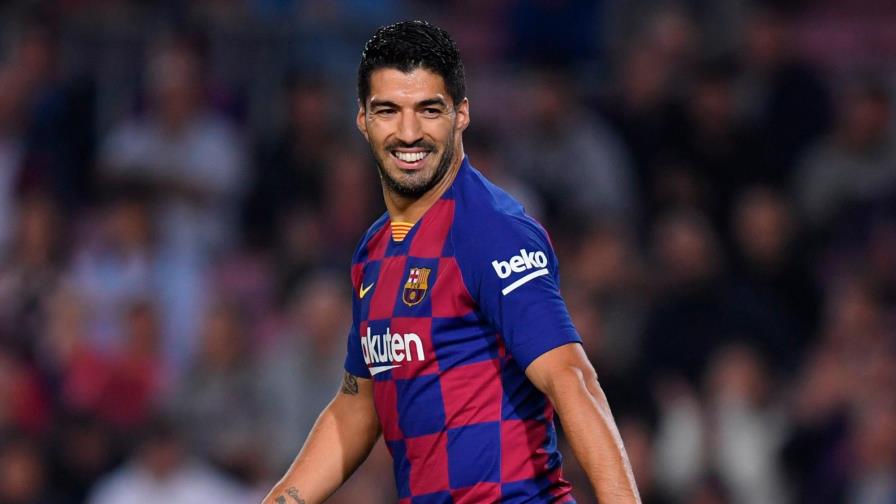 Suárez y Vinicius juegan a la videoconsola con niños enfermos de cáncer