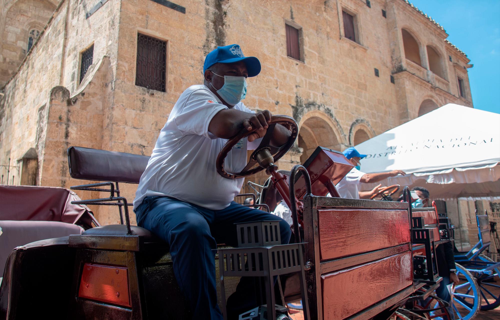 Uno de los cocheros, listos para transportar personas