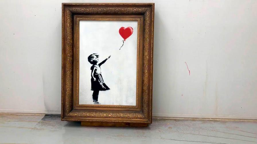 El cuadro “Niña con globo” de Banksy vendido en 18,6 millones de libras, un récord para el artista
