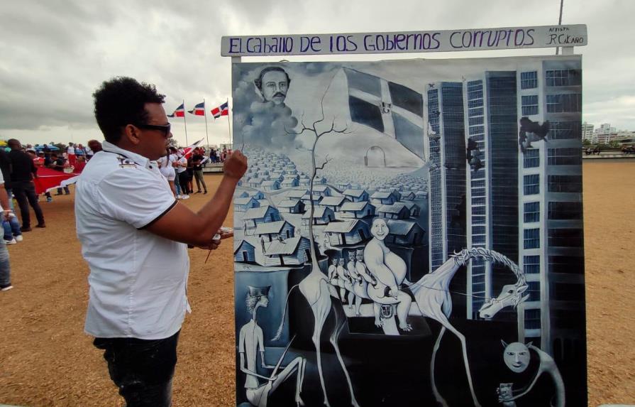 “El caballo de los gobiernos corruptos”, obra pintada frente a la JCE que crítica a autoridades