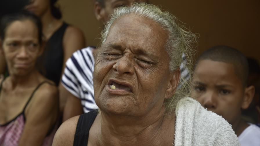 Familiares de cabo que mataron en pica pollo de Villa Mella dudan que se tratara de un asalto Familiares de cabo que mataron en pica pollo de Villa Mella dudan que se tratara de un asalto