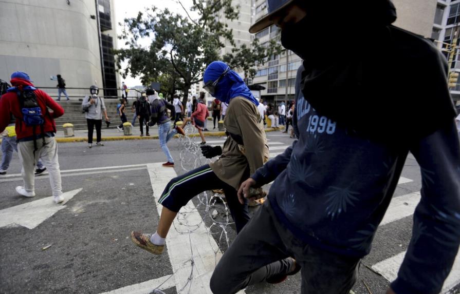 Suben a 26 los muertos en cuatro días de disturbios en Venezuela, según ONG