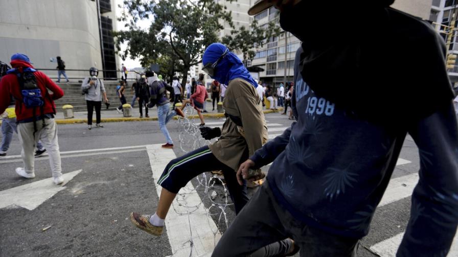 Suben a 26 los muertos en cuatro días de disturbios en Venezuela, según ONG Suben a 26 los muertos en cuatro días de disturbios en Venezuela, según ONG