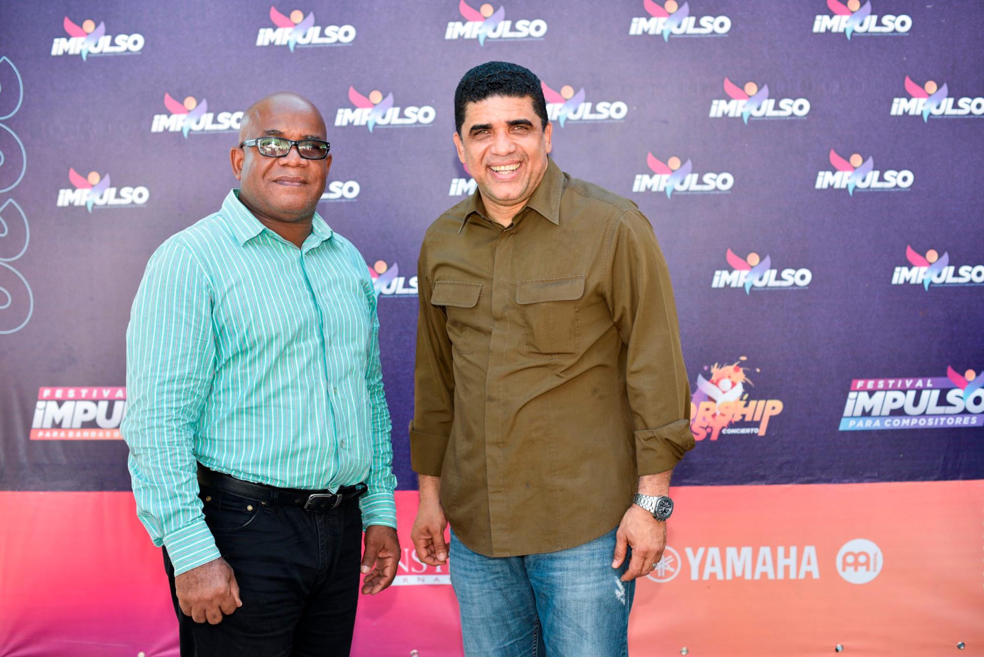 Roberto Guzmán y Pastor Dio Astacio.