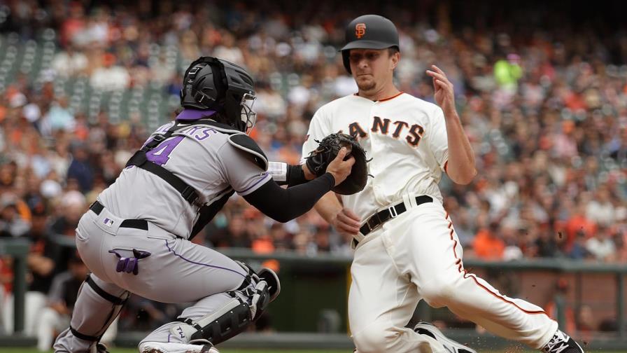 Dahl conecta grand slam y Rockies derrotan 6-3 a Gigantes