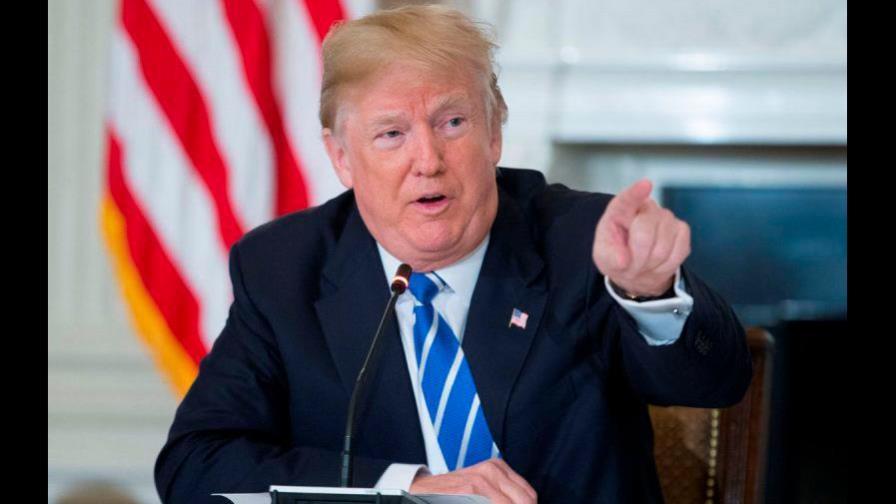 Trump demanda al New York Times por difamación por un artículo sobre interferencia rusa Trump demanda al New York Times por difamación por un artículo sobre interferencia rusa