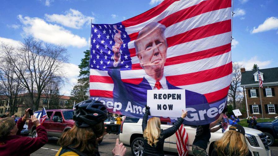 Trump exige que tres estados levanten confinamiento por virus