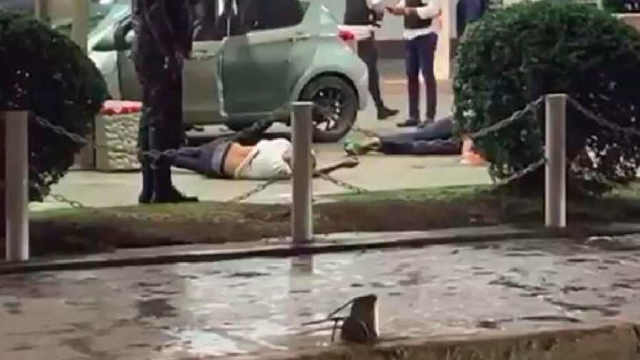 Policía confirma los tres hombres abatidos por agentes intentaron asaltar estación de combustible 