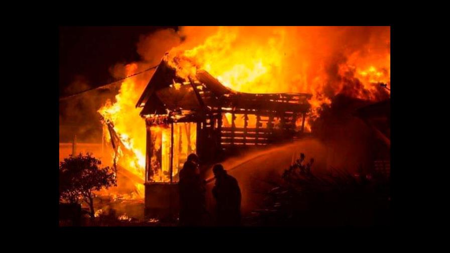 Matan a tiros capitán de la Policía; familiares del agente queman casa del victimario Matan a tiros capitán de la Policía; familiares del agente queman casa del victimario