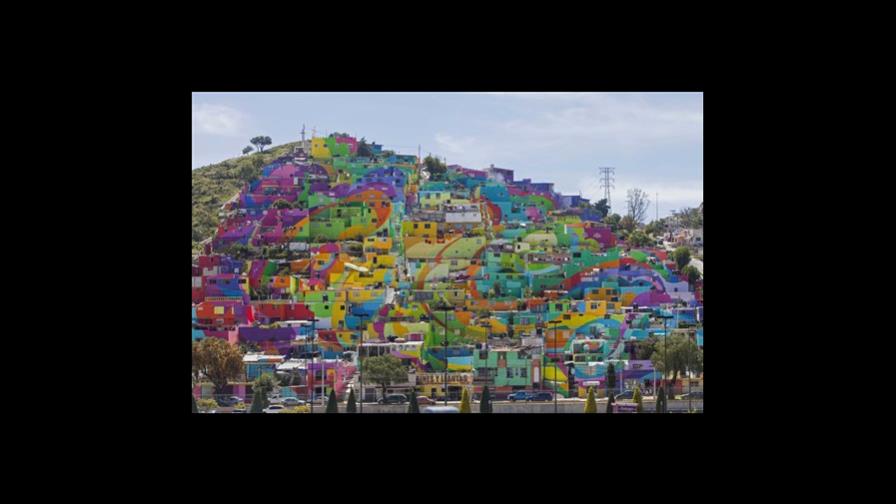 Barrio se transforma en enorme mural colectivo