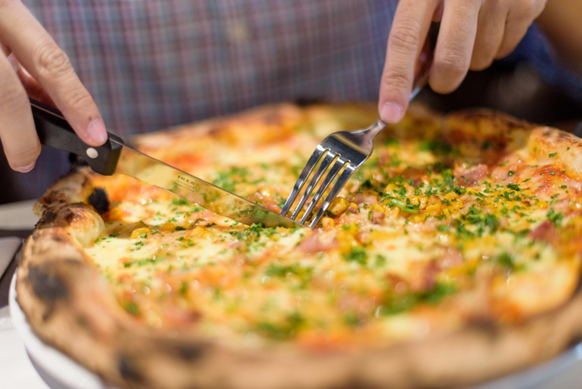 Uno de las pizzas exclusivas de Trattoria Pizzarelli, La Contadina.