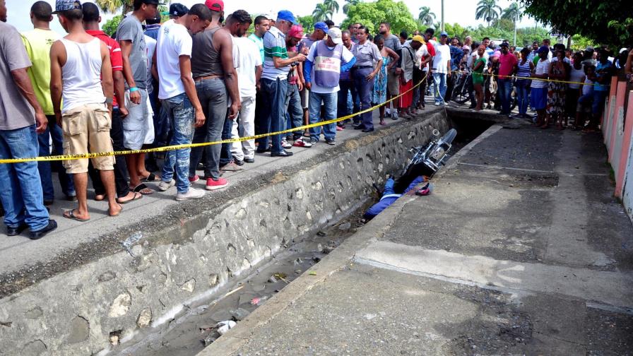 La Policía investiga muerte a tiros de mensajero en Santiago