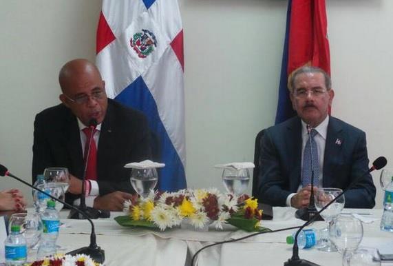 Danilo Medina y Martelly abren un compás de negociaciones para superar el diferendo comercial