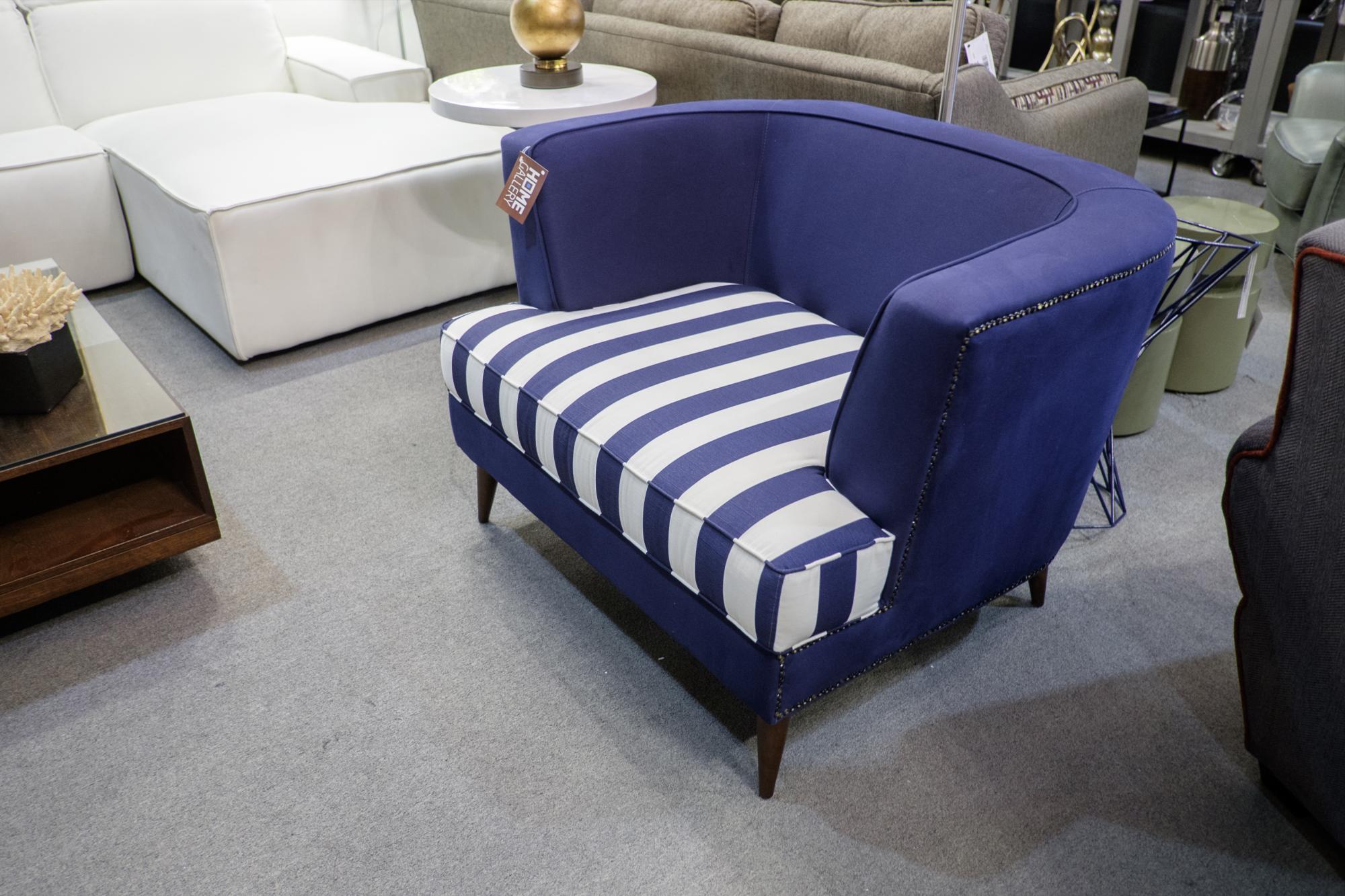 Esta butaca marinera, también de Home Gallery, es recomendable para la habitación de niños y bebés. También queda bien en casas de playa.