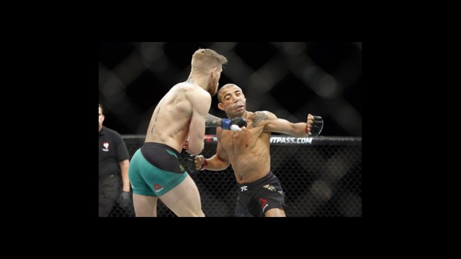 Video: McGregor frena a Aldo en 13 segundos, gana cinturón UFC Video: McGregor frena a Aldo en 13 segundos, gana cinturón UFC