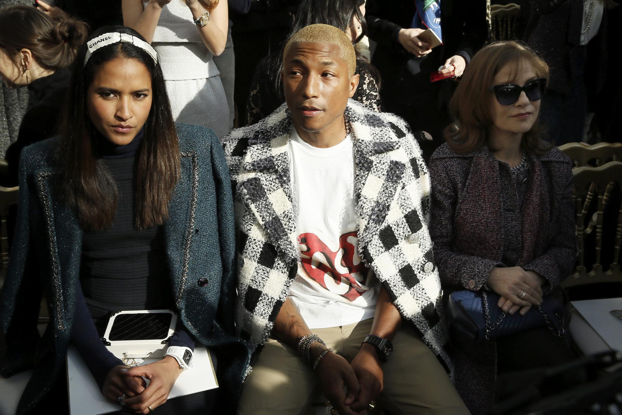 Pharrell Williams y su esposa Helen Lasichanh.