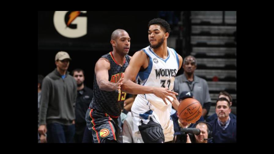 Towns coquetea con marca de dobles-dobles de Horford