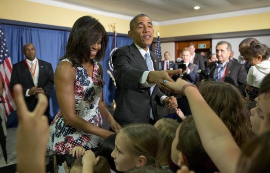 Lluvia, flores y un “¿qué bolá?” marcan las primeras horas de Obama en Cuba