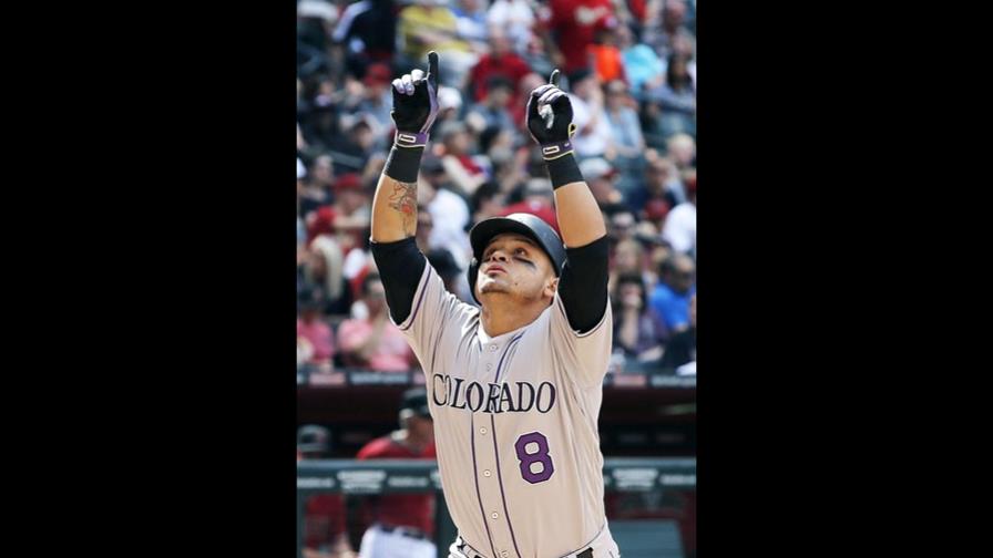 Con jonrones de Parra y Arenado, Rockies se imponen