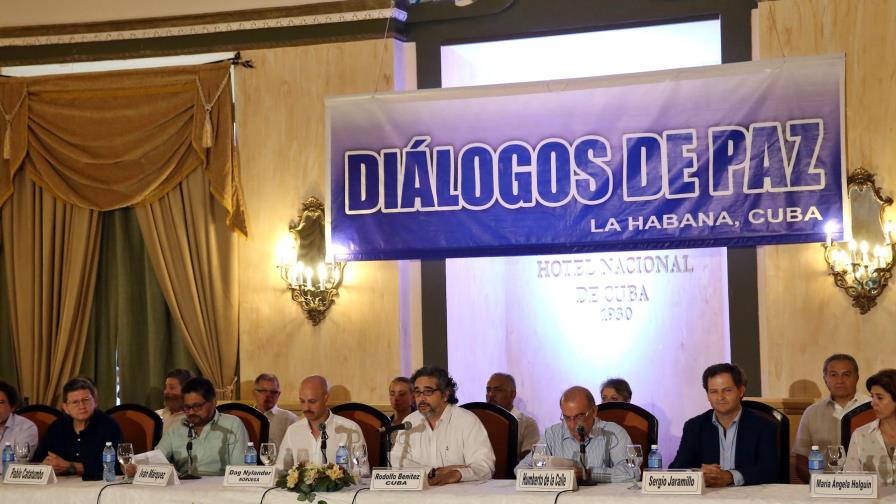 Gobierno y FARC acuerdan plan para salida de menores de 15 años de guerrilla