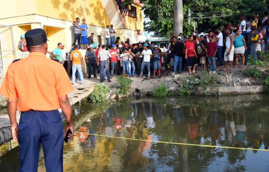 Recuperan cadáver de mujer que se habría lanzado al río Yaque para no ser atracada